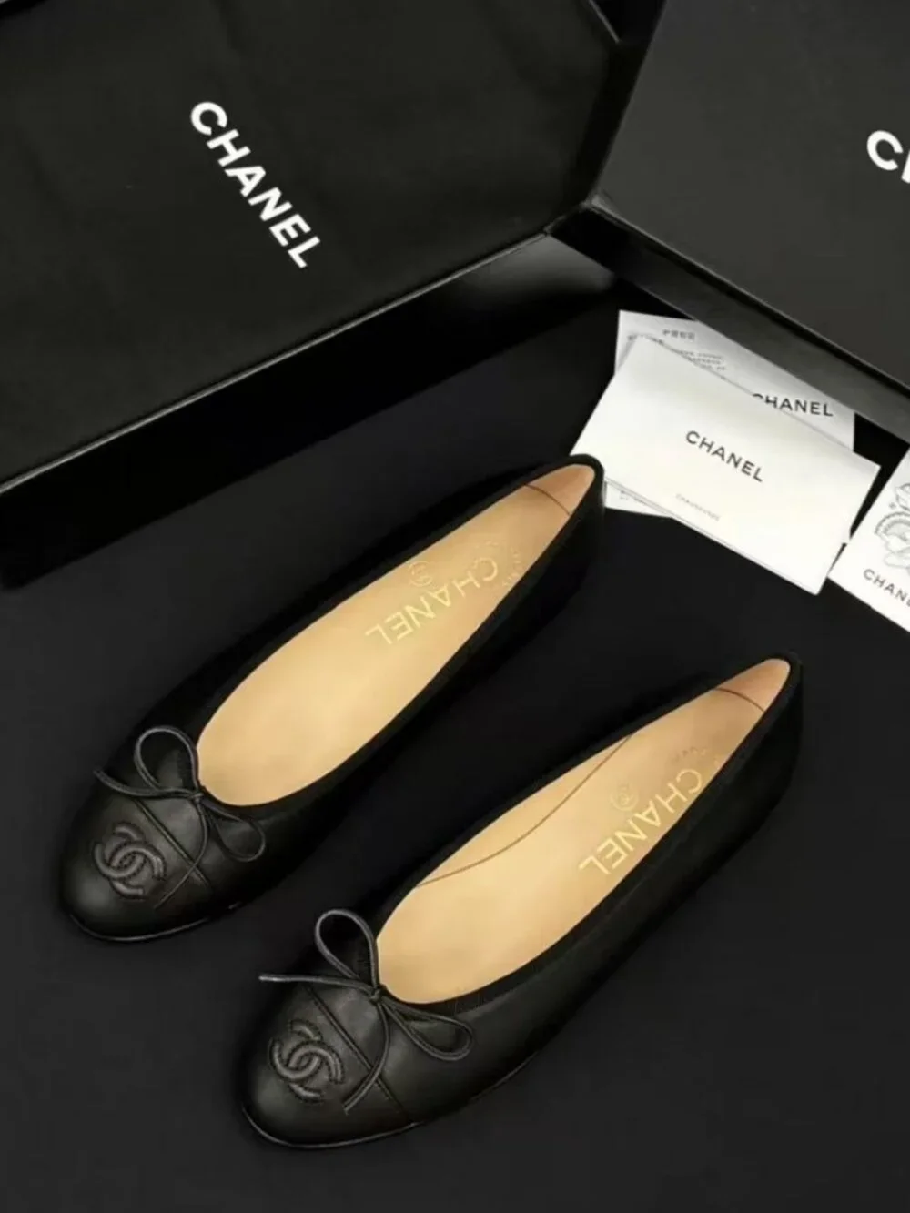 CHANEL All-Black Leather Bow Embossed CC Ballerina Flat Shoes